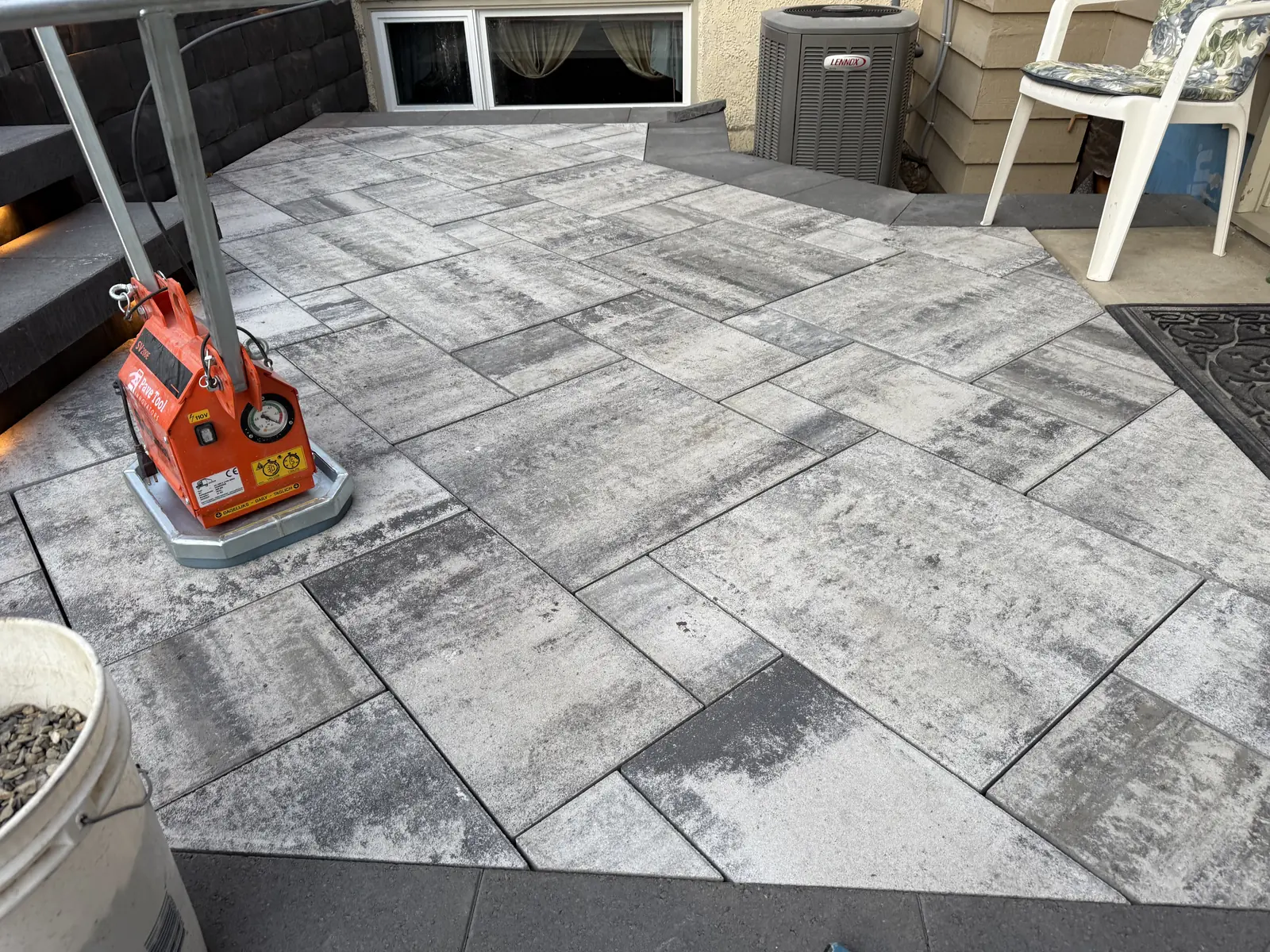 Large format paver patio laid in a random pattern