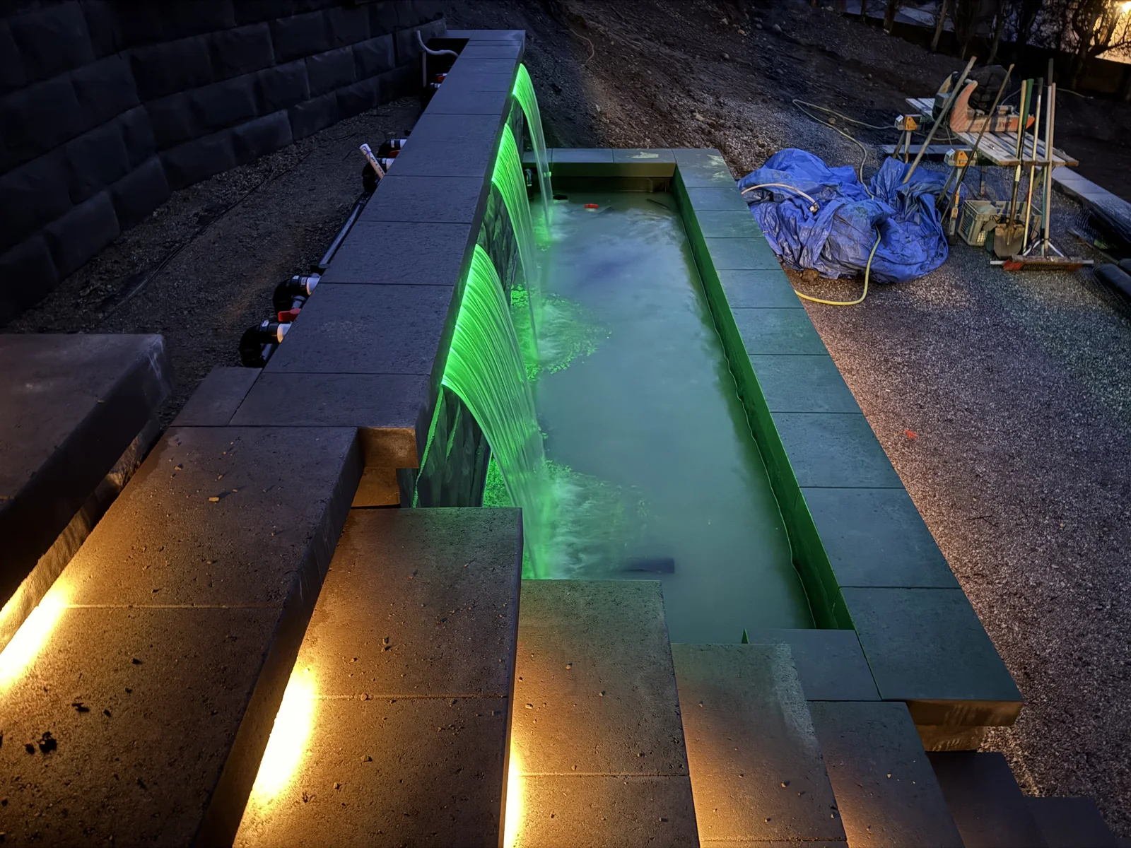 Water feature tested in green light with the step lights on